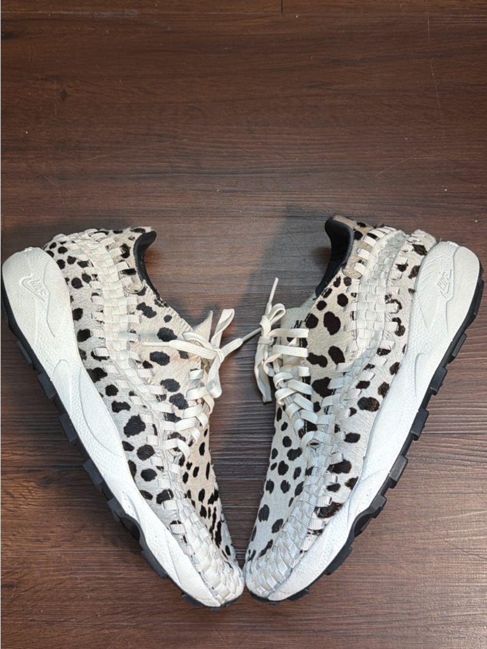 Nike Air Footscape Woven sneakers in the "White Cow Print" colorway